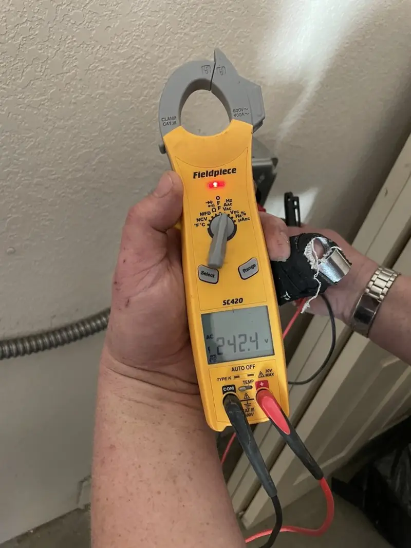 Voltage testing with clamp meter during Electrical Installation Services in Capitola